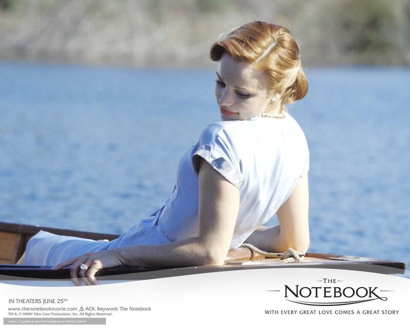 woman in boat by lake