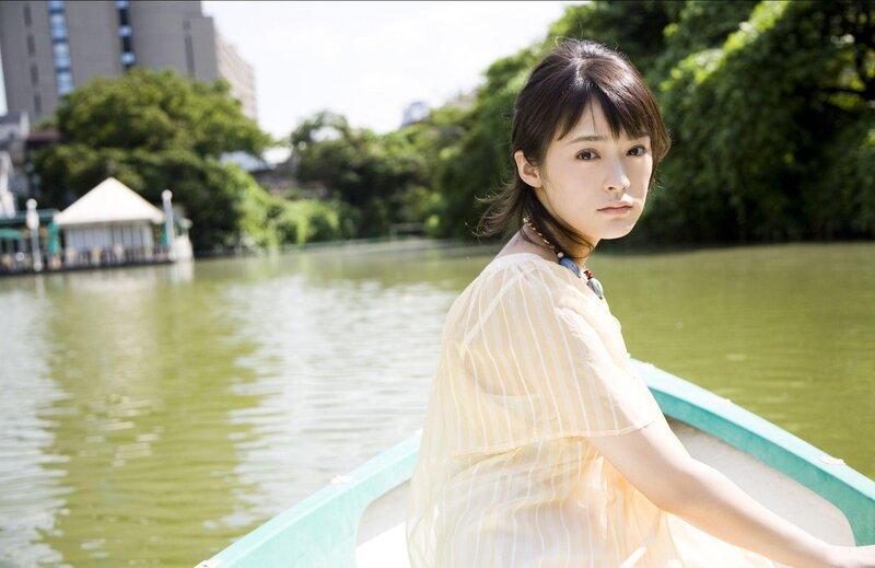 woman in boat on river