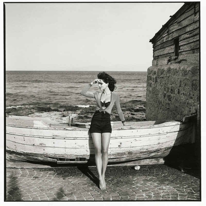 Woman in Boat on Shore