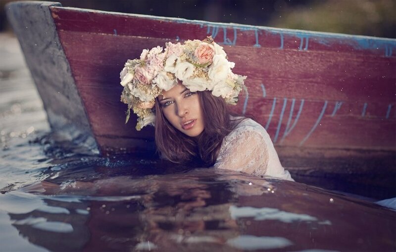 Woman in Boat with Flower Crown