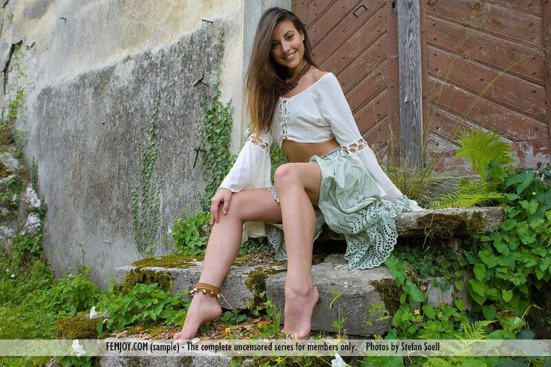 woman in boho dress on steps