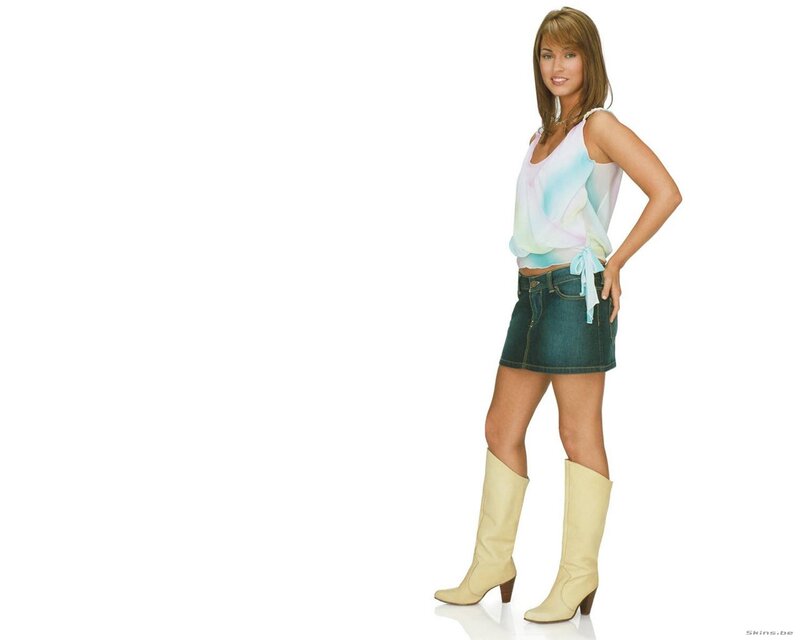 woman in boots and skirt