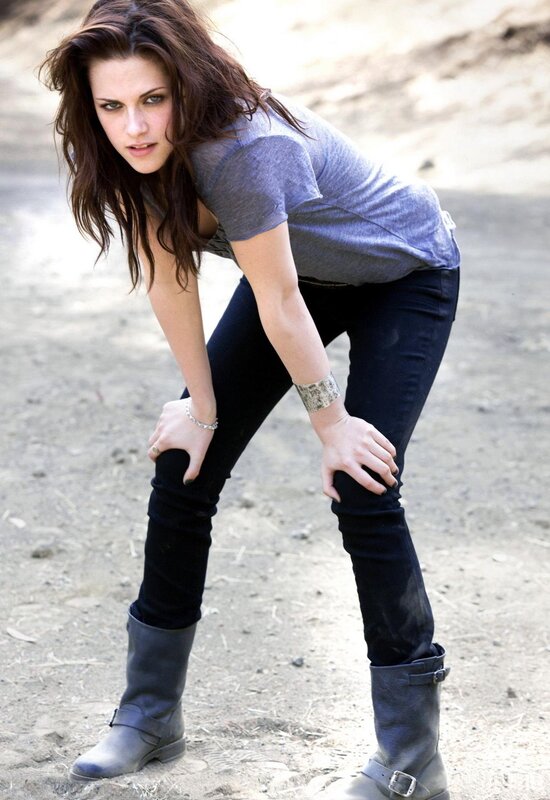woman in boots leaning forward
