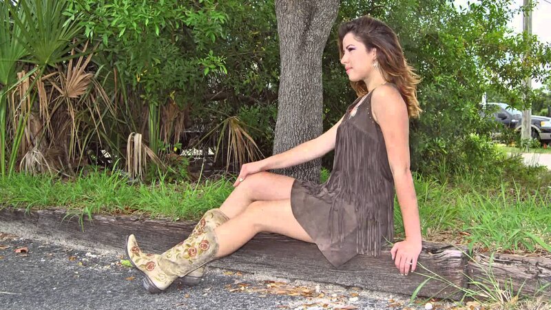 Woman in Boots Sitting — Brown, Calm