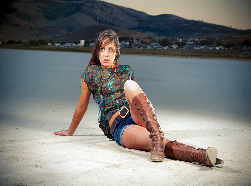 Woman in Boots Sitting — Brown, Dramatic