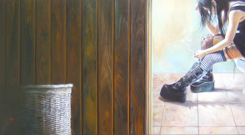 woman in boots sitting on floor