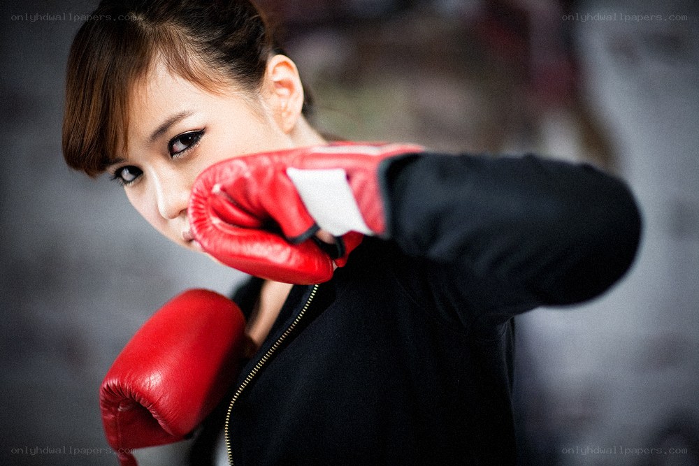 woman in boxing gloves