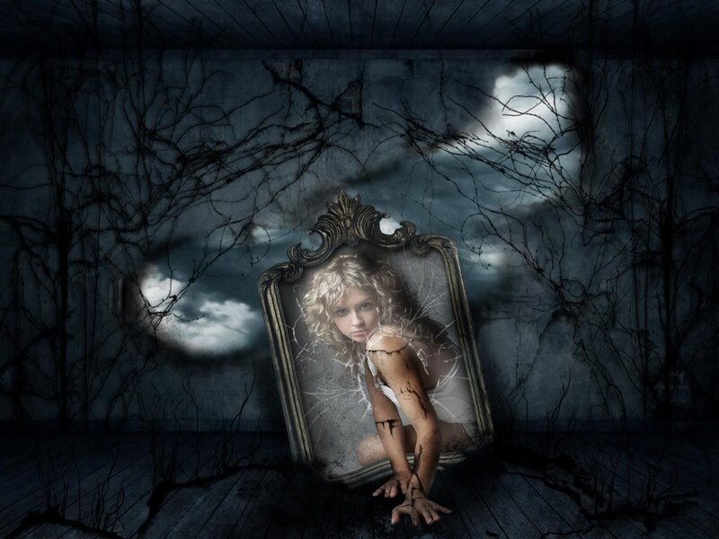 Woman in Broken Mirror