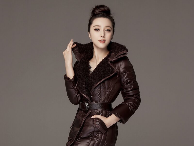 woman in brown coat