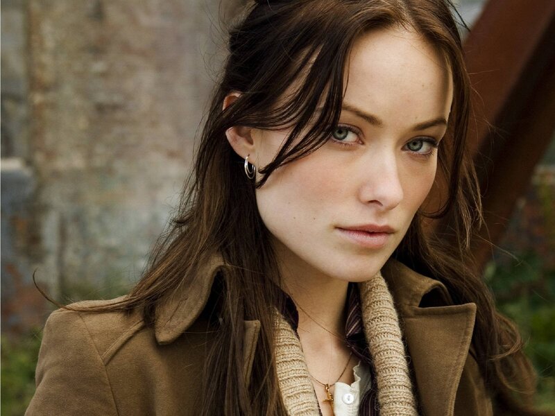 woman in brown coat