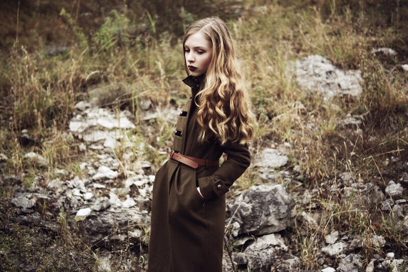 woman in brown coat outdoors