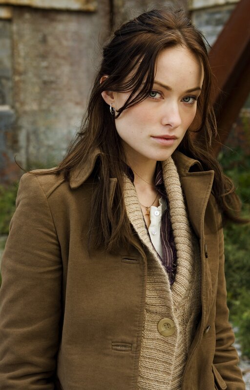 woman in brown coat