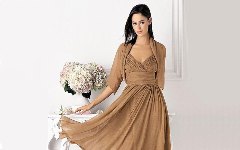 woman in brown dress with flowers
