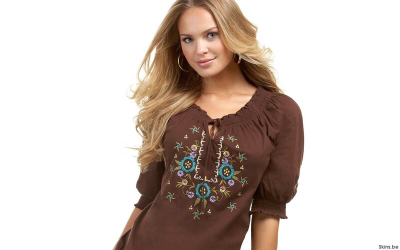 woman in brown embroidered top