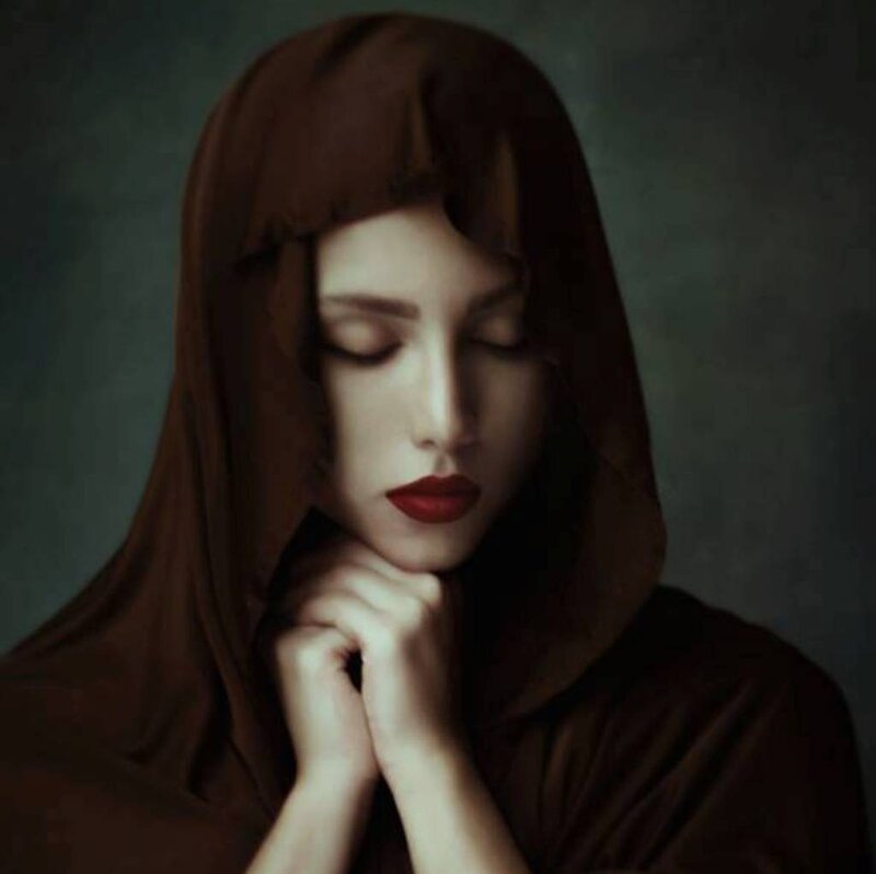Woman in Brown Hood — Dramatic
