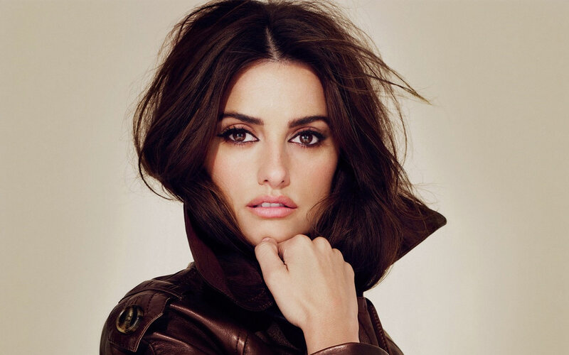 Woman in Brown Jacket — Serious