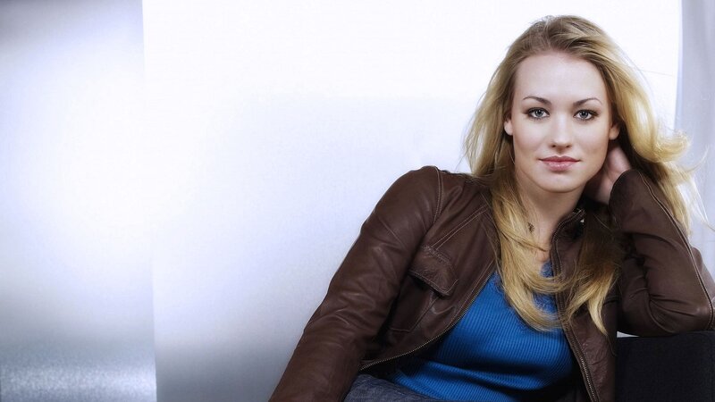 woman in brown leather jacket