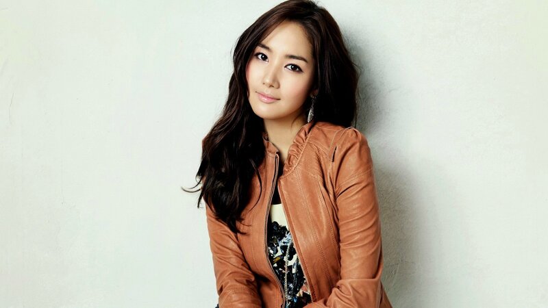 woman in brown leather jacket
