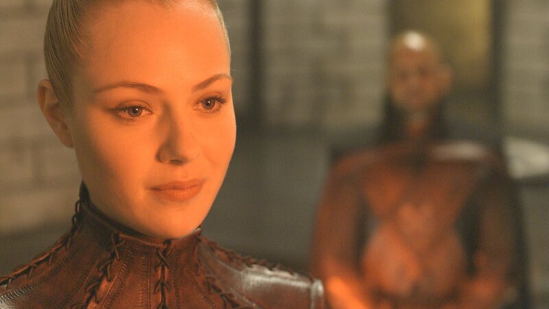 woman in brown leather outfit