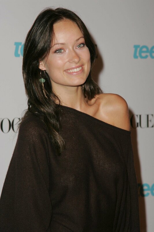woman in brown off-shoulder top