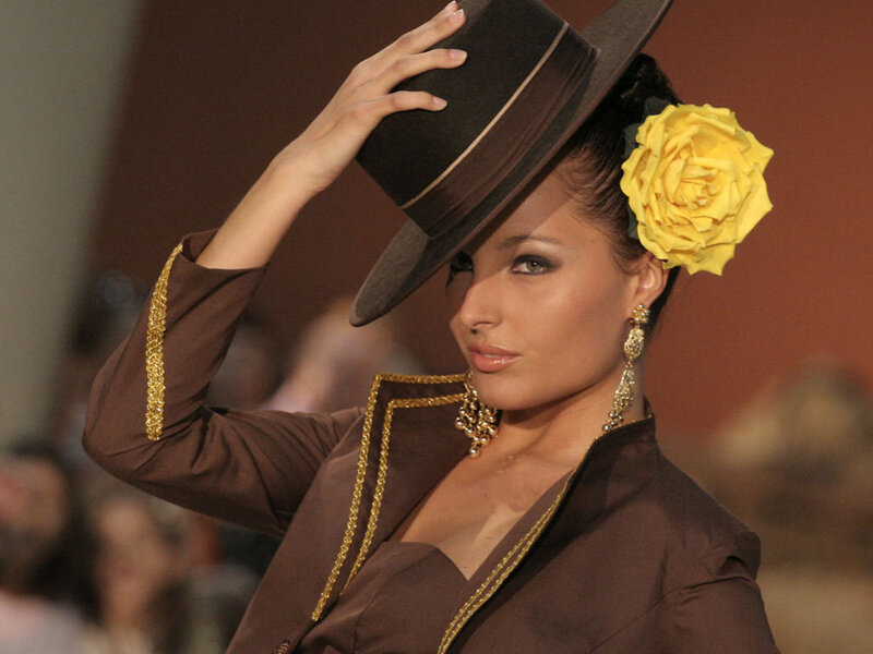 Woman in Brown Outfit — Dramatic, Photograph, Hat