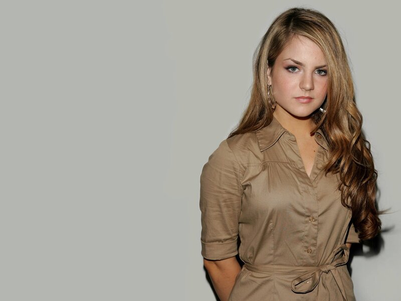 woman in brown shirt