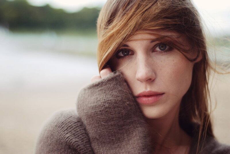 woman in brown sweater