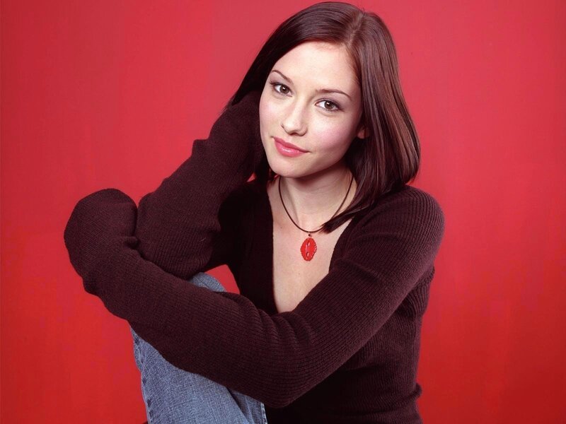 woman in brown sweater