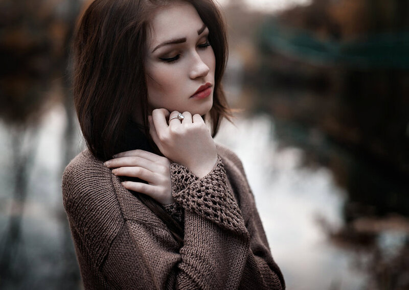 Woman in Brown Sweater — Contemplative