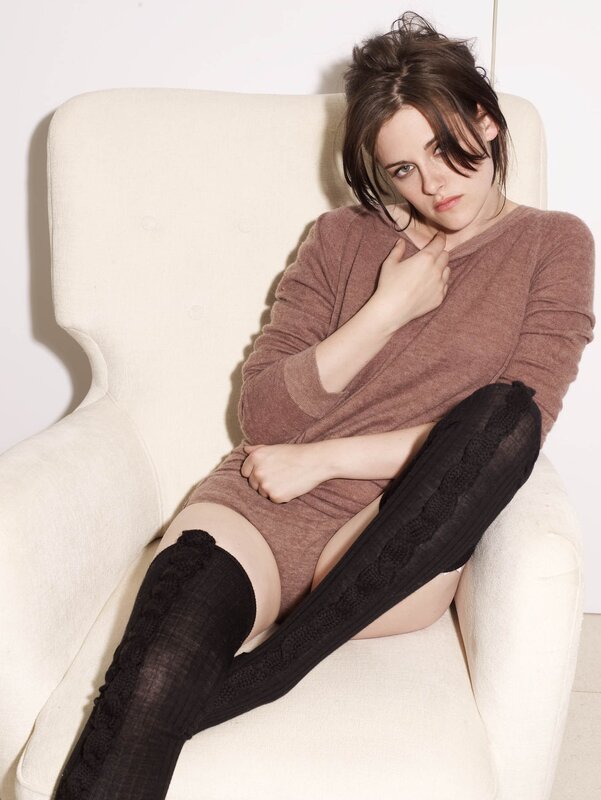 woman in brown sweater sitting