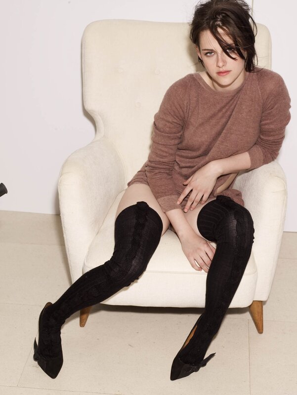 woman in brown sweater sitting
