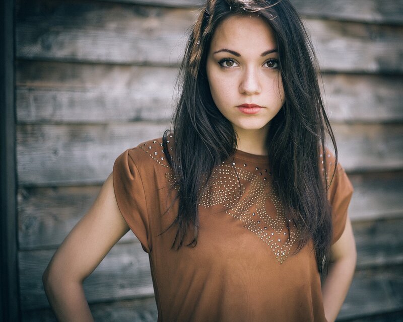woman in brown top