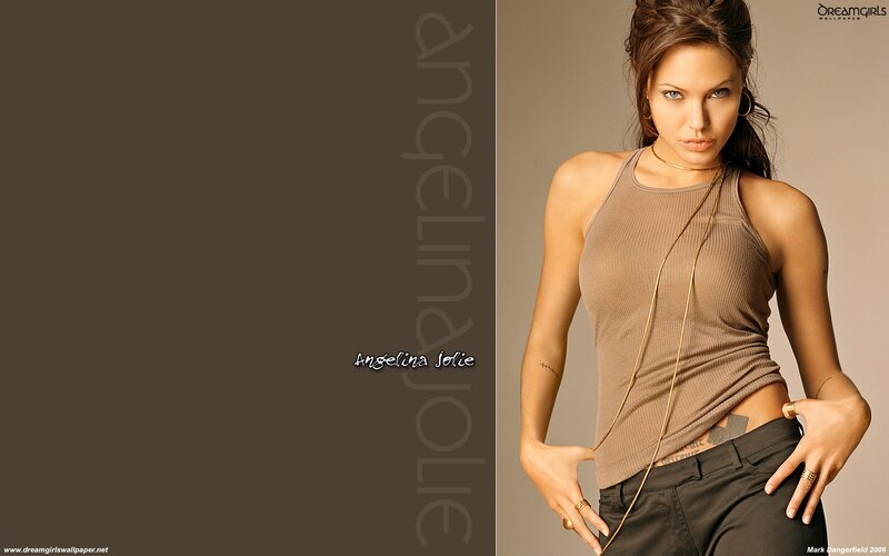 Woman in Brown Top — Confident, Photograph, Tattoo