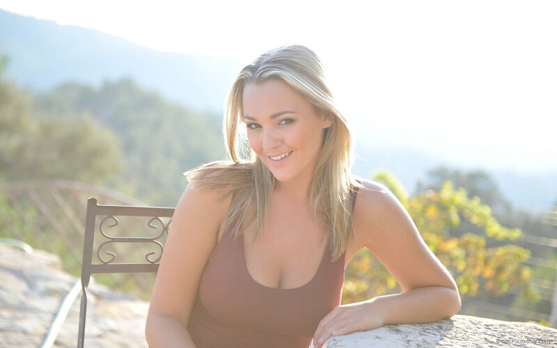 woman in brown top outdoors