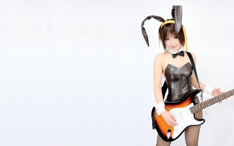 Woman in Bunny Costume — White, Playful, Photograph