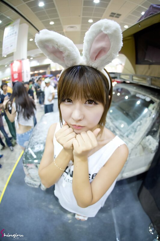 Woman in bunny ears at event