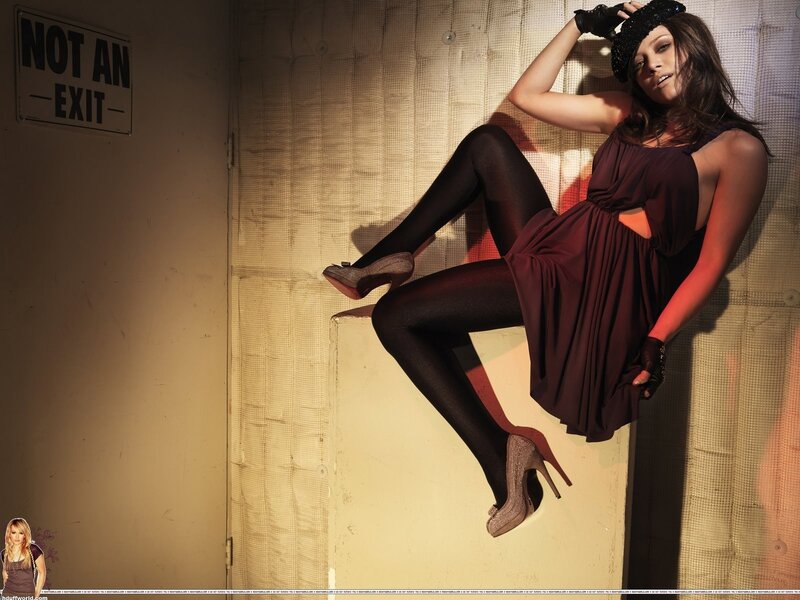 woman in burgundy dress posing