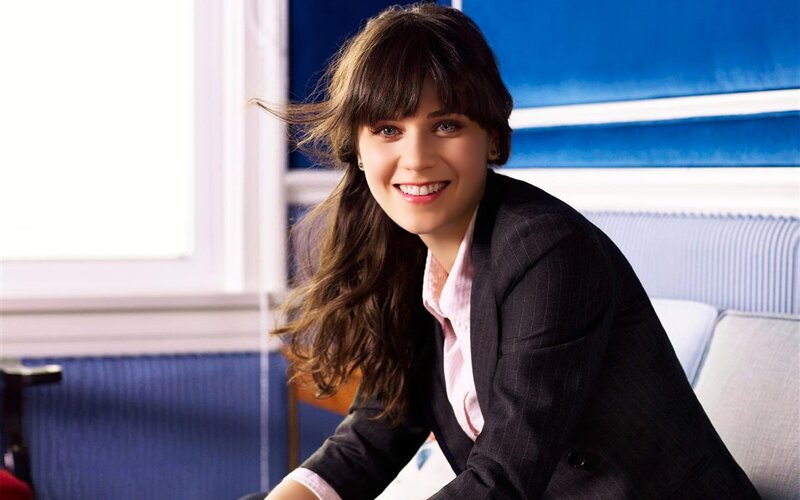 woman in business suit smiling