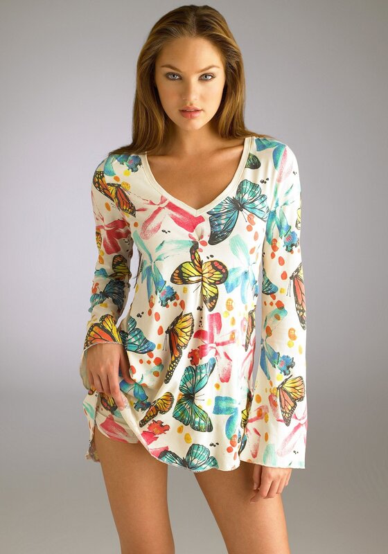 Woman in butterfly print top