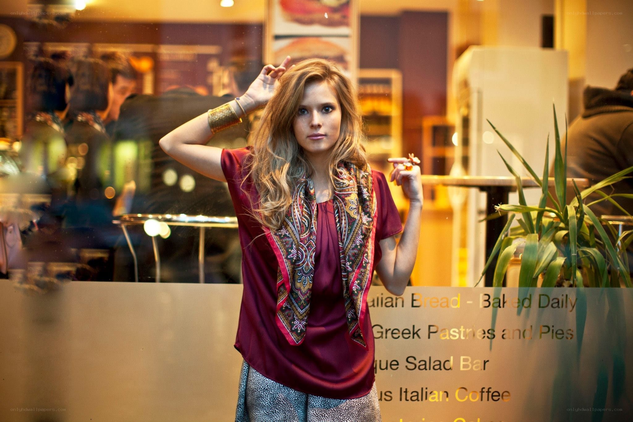Woman in cafe window