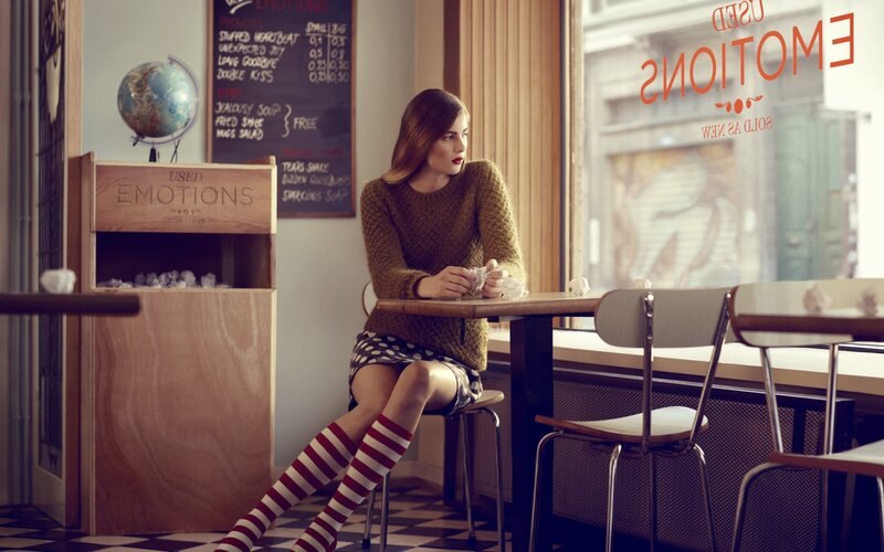 Woman in cafe with red and white socks