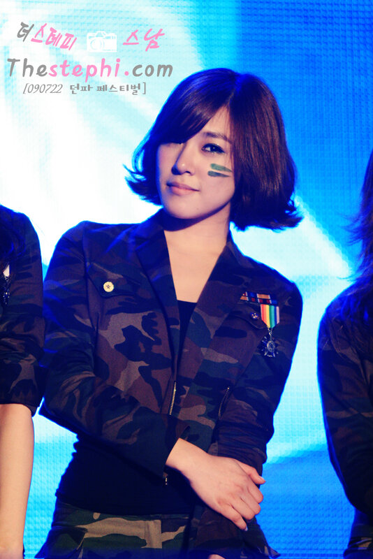 woman in camouflage jacket