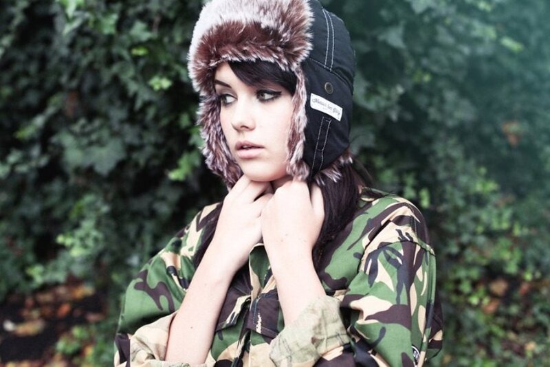 woman in camouflage jacket
