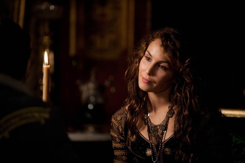 woman in candlelit room