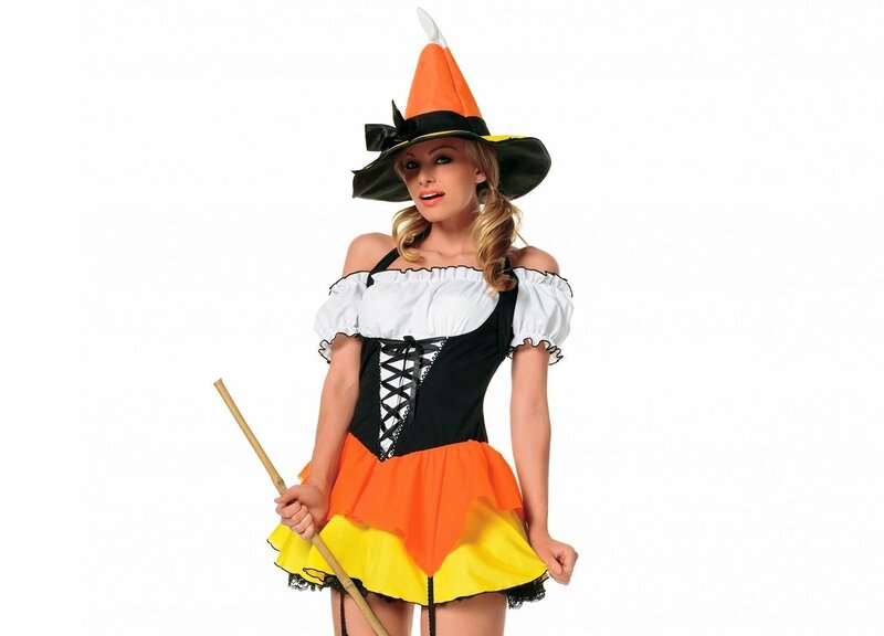 woman in candy corn witch costume
