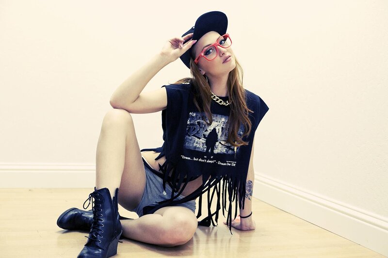 woman in cap and glasses