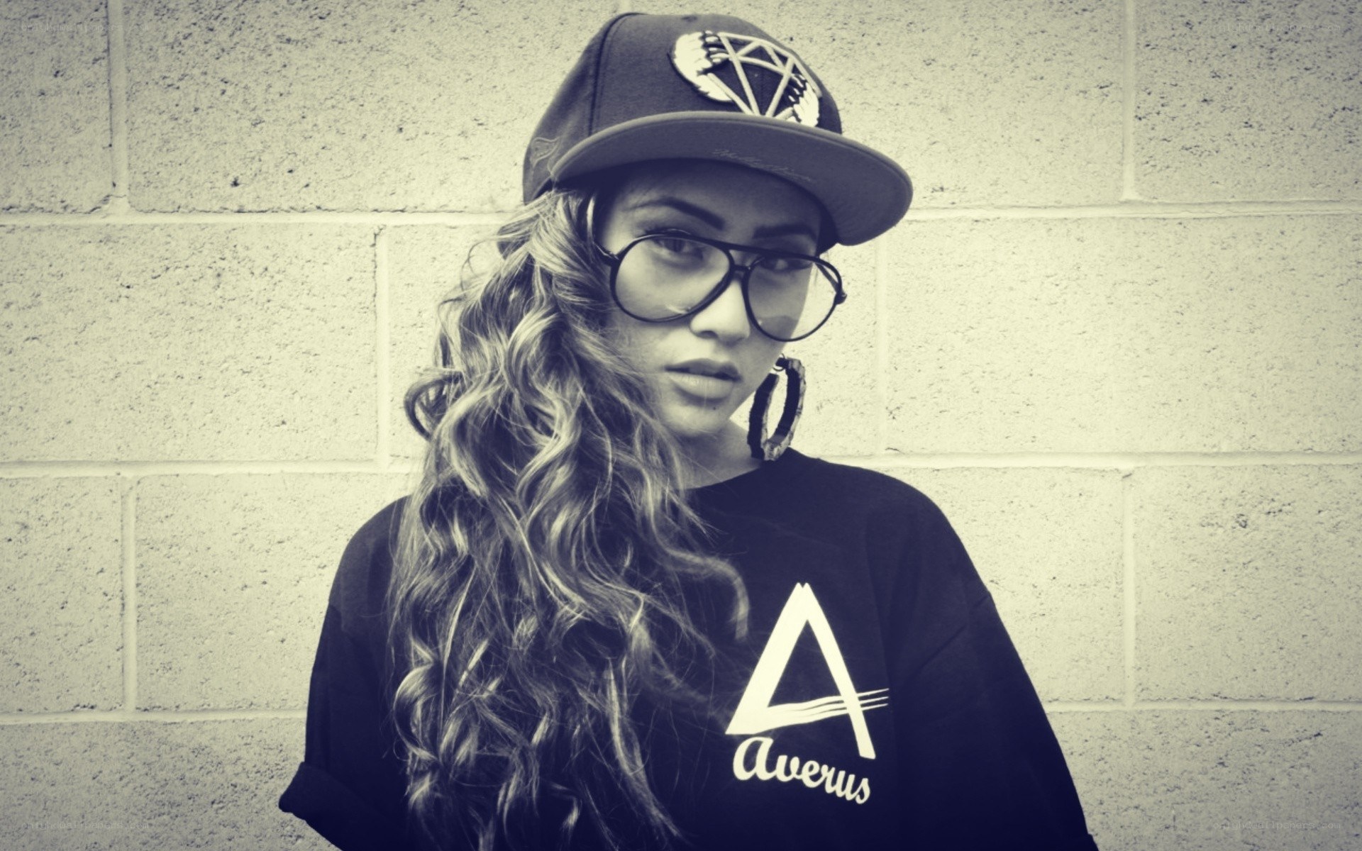 woman in cap and glasses