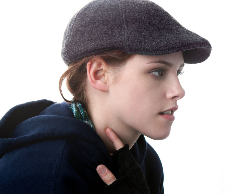 woman in cap and hoodie