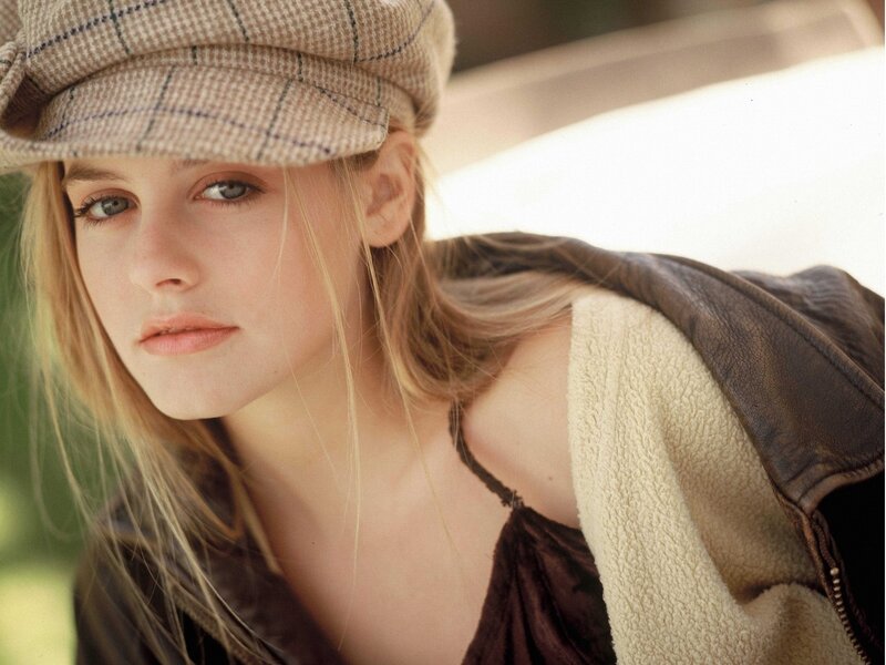 woman in cap and jacket