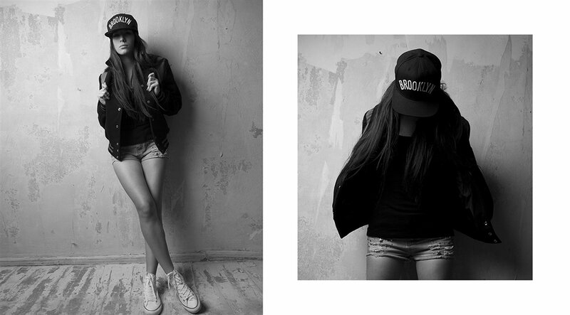 Woman in Cap and Shorts — Black